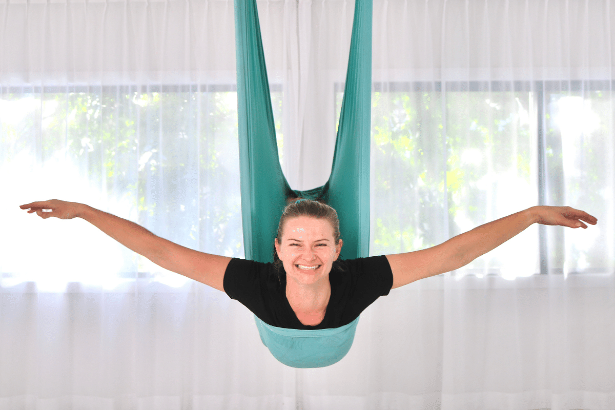 Aerial Yoga: Definition, Benefits, Poses, Tips and More